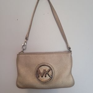 Michael Kors gold wristlet